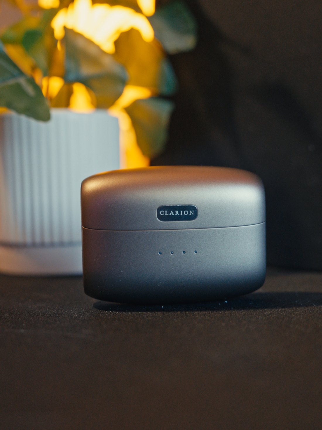 The case closed on a desk, CLARION nameplate facing forward.